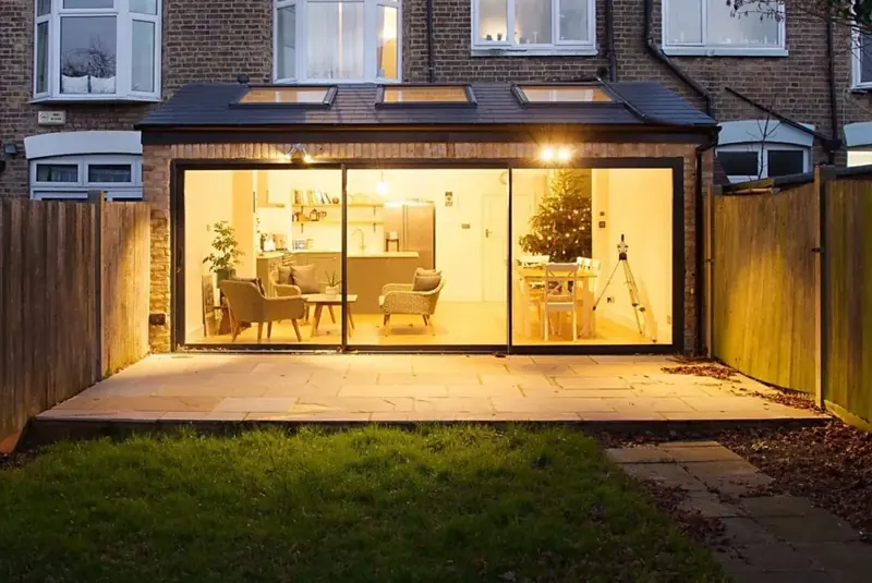 Terraced house rear extension with sliding doors, built by ATKINSONS