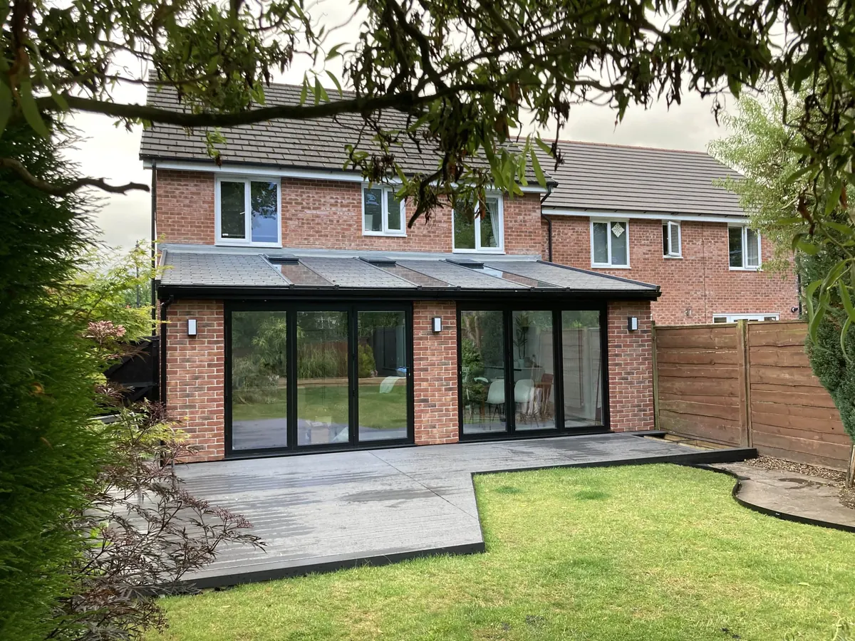 Single-storey rear extension with bifold doors and roof skylights built by ATKINSONS
