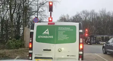 ATKINSONS Building Division van on the road