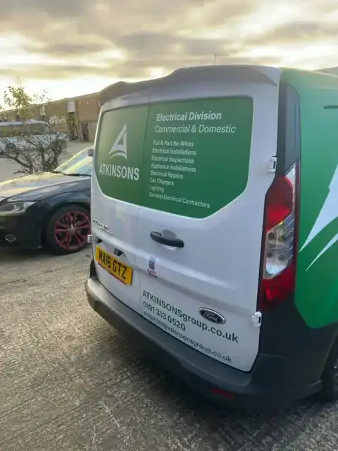 ATKINSONS Electrical Division van at sunset