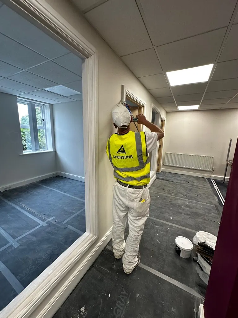 ATKINSONS decorator on a commercial maintenance contract