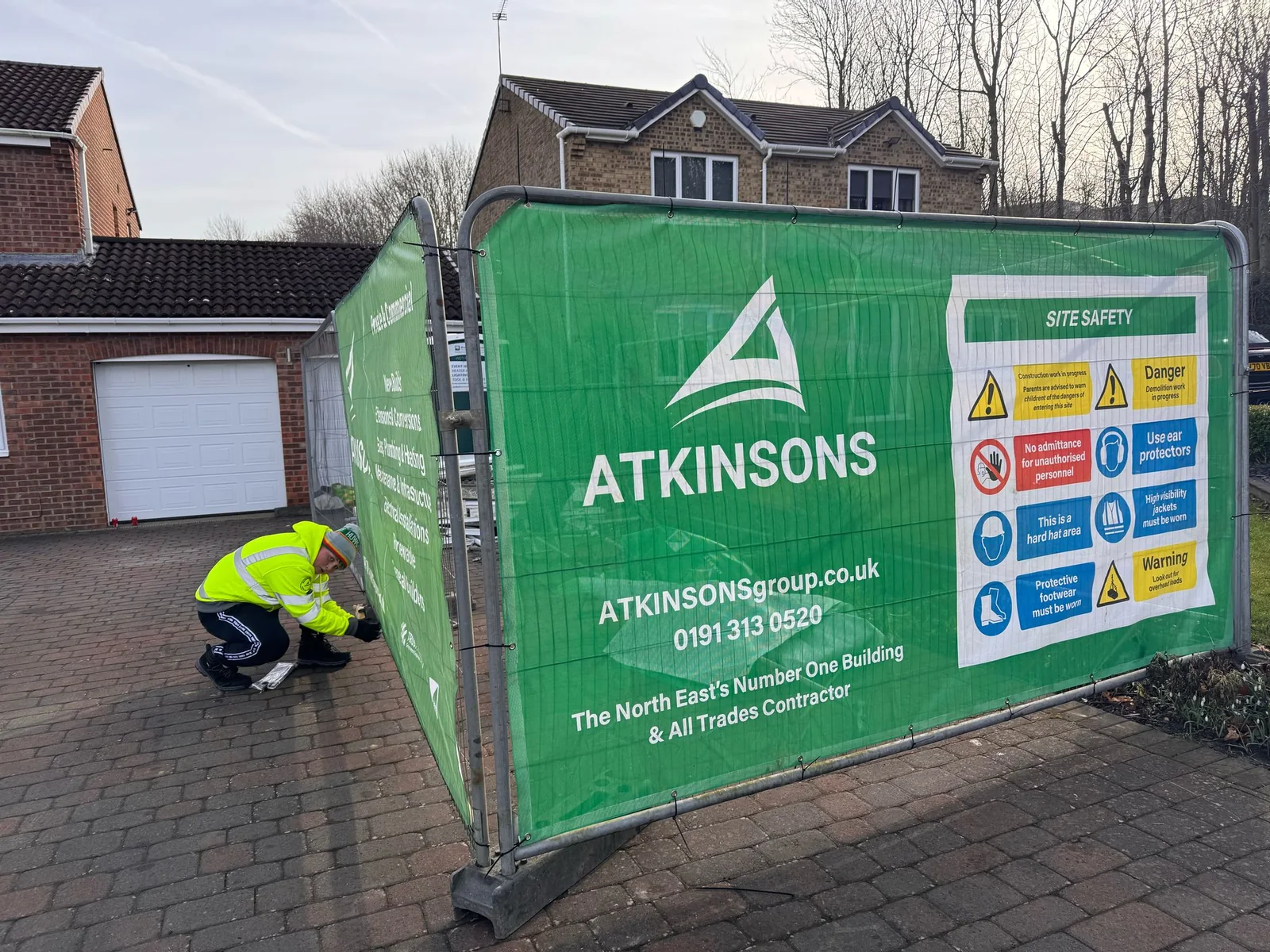 ATKINSONS branded site safety hoarding on a live job in the North East