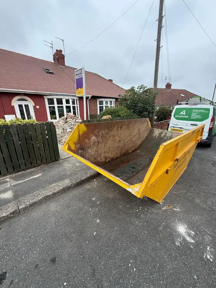 ATKINSONS site set up with a skip for safe waste management